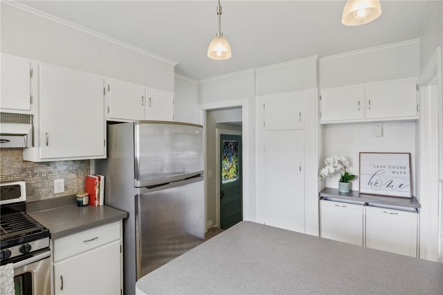 316 Walzer Rd, Irondequoit, NY 14622 - kitchen with stainless steel appliances, backsplash, white cabinetry, dark countertops, and ornamental molding
