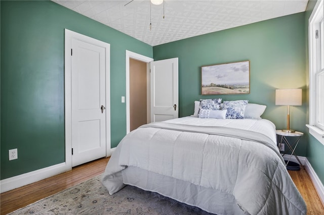 316 Walzer Rd, Irondequoit, NY 14622 - bedroom featuring wood finished floors and ceiling fan