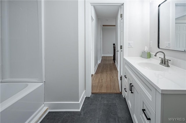 7395 W Somerset Rd, Somerset, NY 14008 - bathroom featuring vanity and baseboards