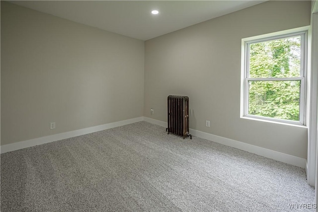 7395 W Somerset Rd, Somerset, NY 14008 - carpeted spare room with radiator and recessed lighting