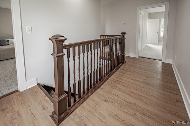 7395 W Somerset Rd, Somerset, NY 14008 - hall with an upstairs landing and wood finished floors
