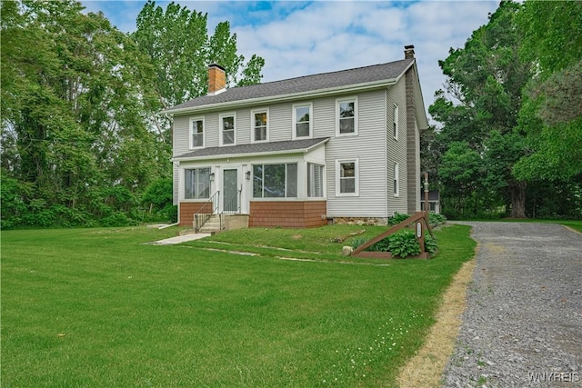 7395 W Somerset Rd, Somerset, NY 14008 - view of front facade featuring a chimney, entry steps, and a front lawn
