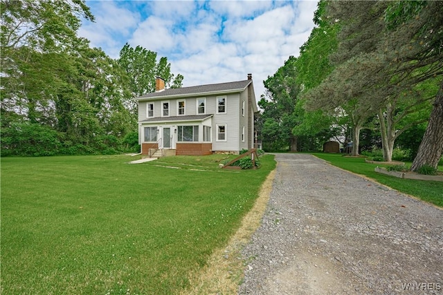 7395 W Somerset Rd, Somerset, NY 14008 - colonial inspired home with a chimney, entry steps, a front lawn, and gravel driveway