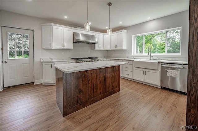 7395 W Somerset Rd, Somerset, NY 14008 - kitchen with stainless steel appliances, wall chimney exhaust hood, light wood-style flooring, white cabinets, and light stone counters