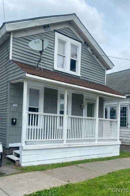 105 Knaul St, Syracuse, NY 13203 - view of side of home with covered porch and a shingled roof