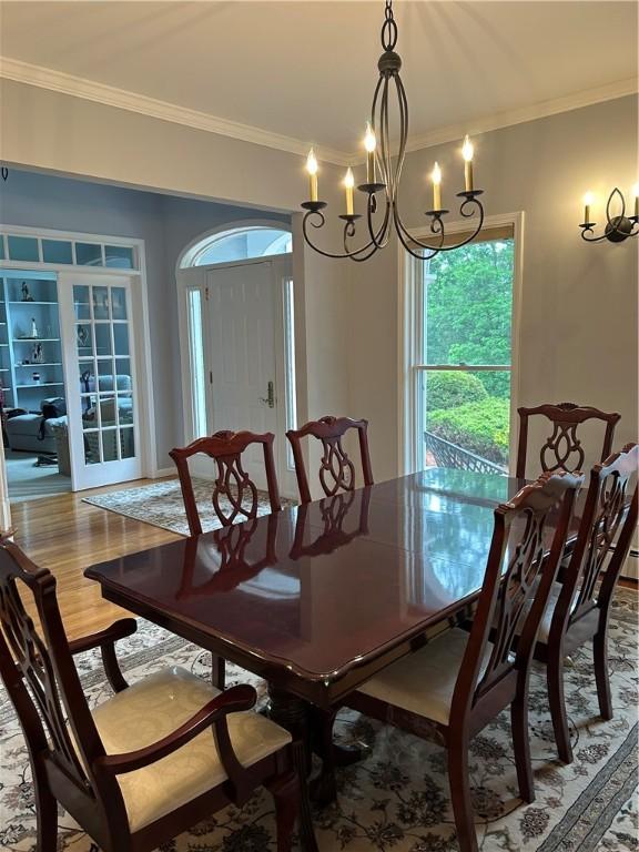 38 Hemlock Ln, Erwin, NY 14870 - dining room with a chandelier, ornamental molding, and wood finished floors