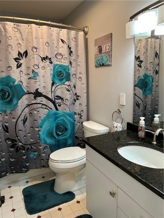 38 Hemlock Ln, Erwin, NY 14870 - full bathroom with vanity, tile patterned flooring, and curtained shower