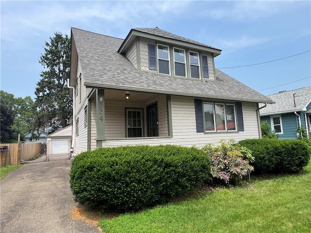 534 Mount Zoar St, Elmira-City, NY 14904 - bungalow with a detached garage, a shingled roof, and an outdoor structure