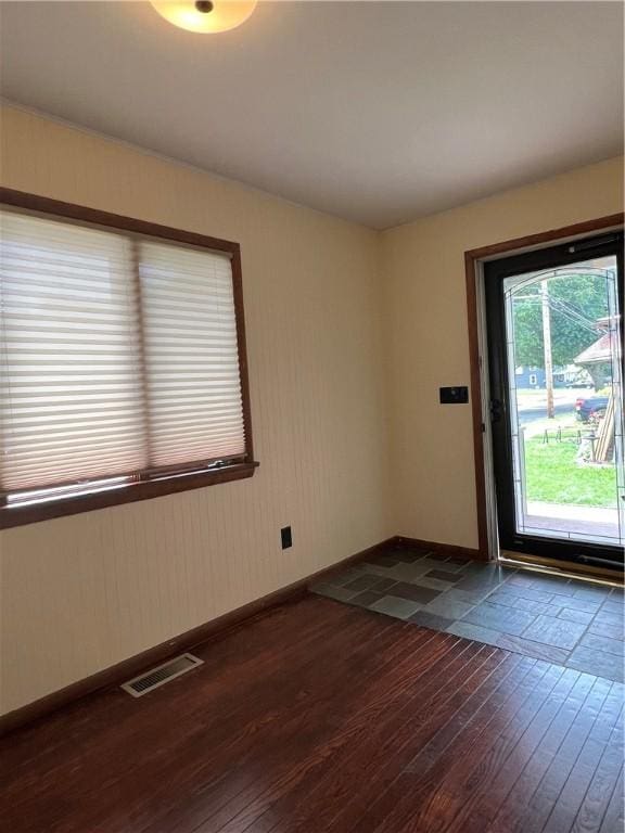 534 Mount Zoar St, Elmira-City, NY 14904 - unfurnished room with dark wood-style floors and baseboards