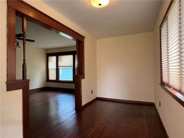 534 Mount Zoar St, Elmira-City, NY 14904 - empty room with dark wood finished floors and ceiling fan