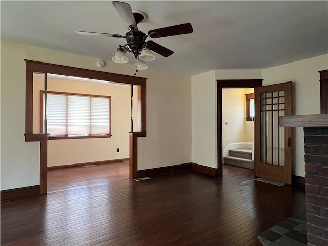 534 Mount Zoar St, Elmira-City, NY 14904 - unfurnished living room with dark wood finished floors and ceiling fan
