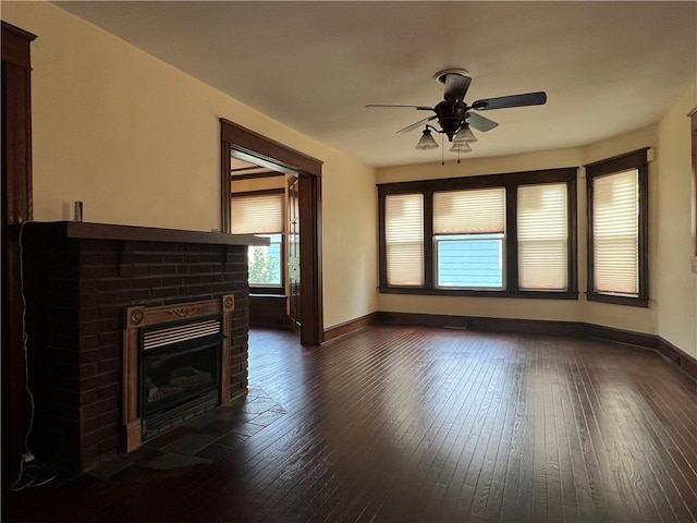 534 Mount Zoar St, Elmira-City, NY 14904 - unfurnished living room featuring a ceiling fan, dark wood finished floors, and a fireplace