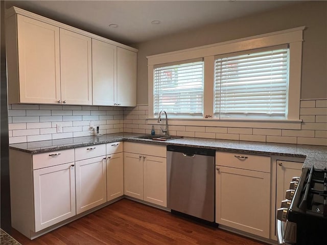 534 Mount Zoar St, Elmira-City, NY 14904 - kitchen featuring dishwasher, gas stove, decorative backsplash, dark wood-style floors, and white cabinets