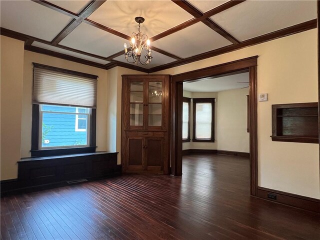 534 Mount Zoar St, Elmira-City, NY 14904 - spare room featuring plenty of natural light, dark wood-type flooring, a chandelier, coffered ceiling, and crown molding