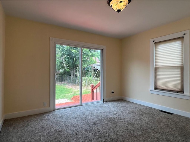 534 Mount Zoar St, Elmira-City, NY 14904 - carpeted empty room featuring baseboards