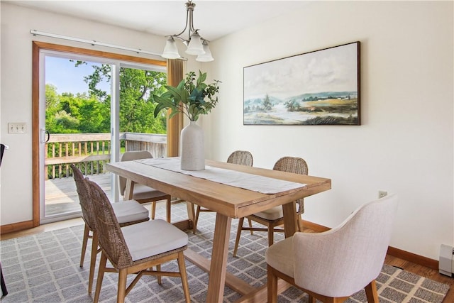 9 Jacob Dr, Erwin, NY 14870 - dining area with light wood-style flooring and a baseboard radiator