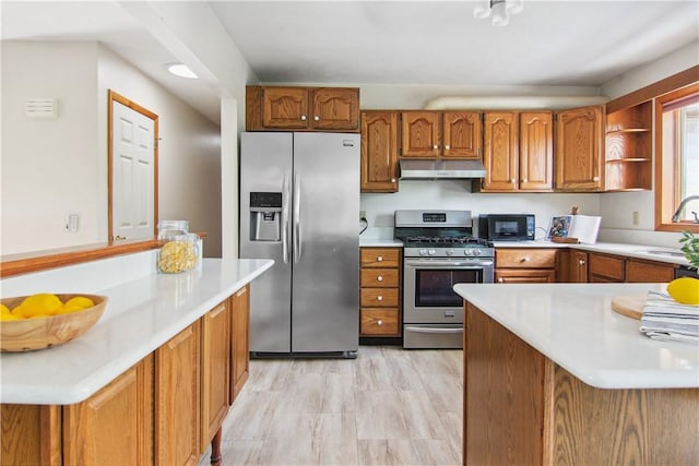 9 Jacob Dr, Erwin, NY 14870 - kitchen with stainless steel appliances, extractor fan, brown cabinetry, light countertops, and open shelves