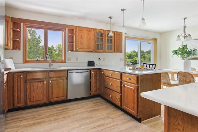 9 Jacob Dr, Erwin, NY 14870 - kitchen featuring stainless steel dishwasher, open shelves, a peninsula, and brown cabinetry