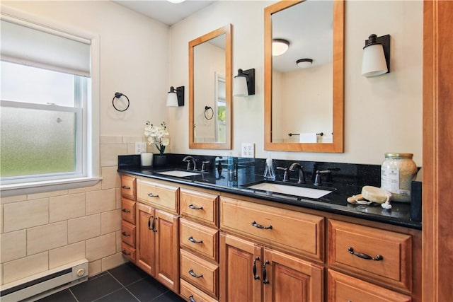 9 Jacob Dr, Erwin, NY 14870 - bathroom featuring baseboard heating, double vanity, tile patterned floors, and tile walls