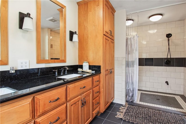 9 Jacob Dr, Erwin, NY 14870 - bathroom with vanity, tiled shower, and tile patterned floors