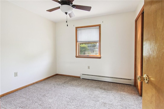 9 Jacob Dr, Erwin, NY 14870 - unfurnished bedroom featuring a baseboard heating unit, carpet floors, and a ceiling fan