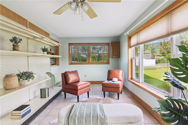 9 Jacob Dr, Erwin, NY 14870 - living area featuring healthy amount of natural light, light tile patterned flooring, and ceiling fan