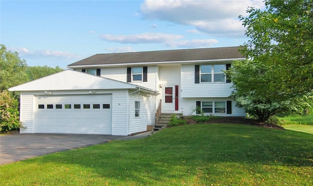 9 Jacob Dr, Erwin, NY 14870 - raised ranch featuring an attached garage, asphalt driveway, a front lawn, and entry steps