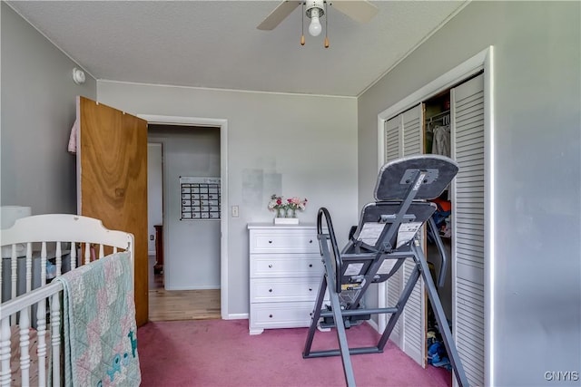 10256 State Route 26, Denmark, NY 13367 - bedroom featuring carpet floors, a closet, ceiling fan, and a crib