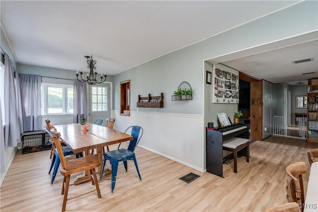 10256 State Route 26, Denmark, NY 13367 - dining room with a chandelier and wood finished floors