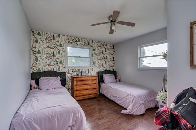 10256 State Route 26, Denmark, NY 13367 - bedroom with wallpapered walls, dark wood finished floors, and ceiling fan