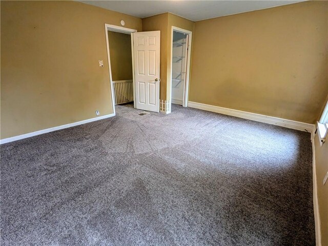 354 Euclid Ave, Elmira City, NY 14905 - unfurnished bedroom with baseboards and carpet
