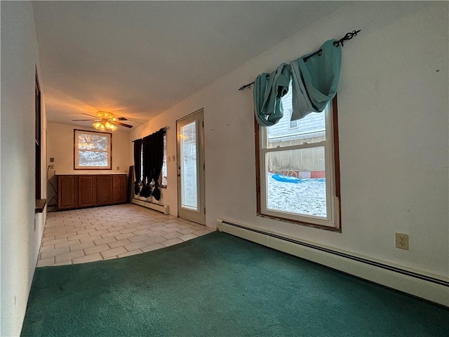 100 Brickwork Rd, Hamlin, PA 16735 - tiled spare room with baseboard heating, carpet flooring, and a ceiling fan
