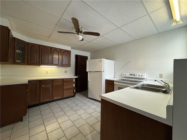 100 Brickwork Rd, Hamlin, PA 16735 - kitchen with white appliances, ceiling fan, a paneled ceiling, light tile patterned flooring, and glass insert cabinets