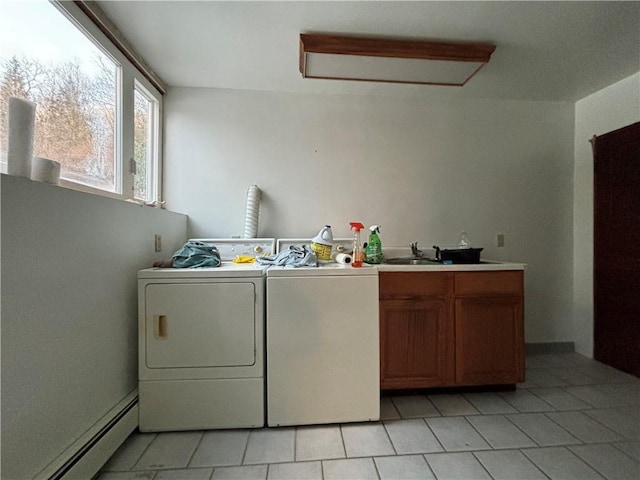 100 Brickwork Rd, Hamlin, PA 16735 - washroom with baseboard heating, washer and dryer, light tile patterned floors, and cabinet space