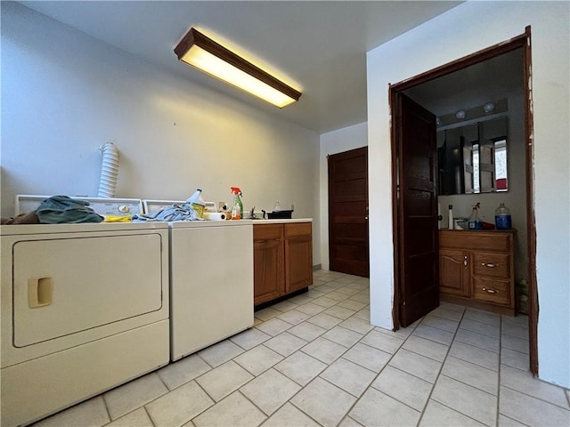 100 Brickwork Rd, Hamlin, PA 16735 - washroom with cabinet space, washing machine and clothes dryer, and light tile patterned floors