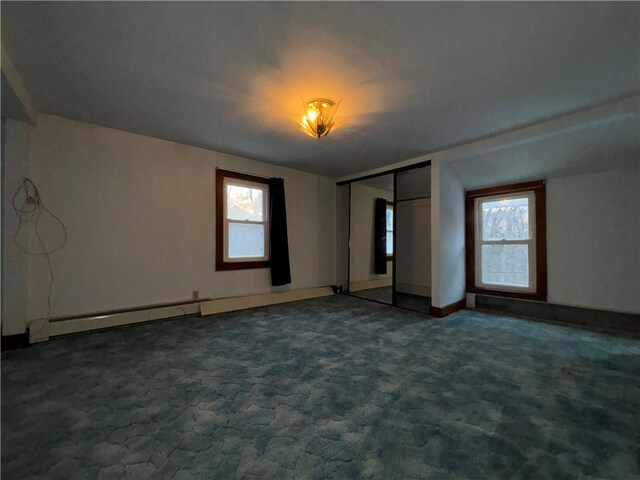 100 Brickwork Rd, Hamlin, PA 16735 - unfurnished bedroom featuring a baseboard radiator and carpet floors