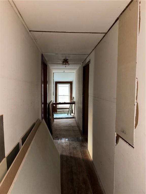 100 Brickwork Rd, Hamlin, PA 16735 - hallway with dark wood-style floors and an upstairs landing