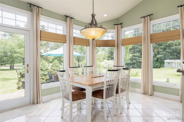 2371 Bullis Rd, Elma, NY 14059 - sunroom / solarium featuring tile patterned floors and vaulted ceiling