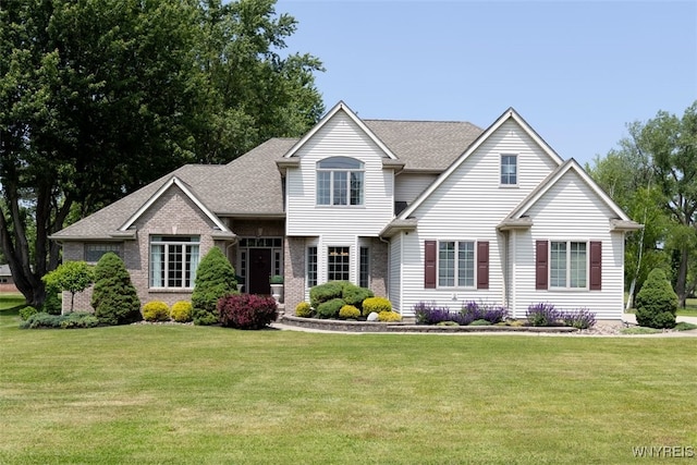 2371 Bullis Rd, Elma, NY 14059 - traditional-style house with a front lawn and brick siding