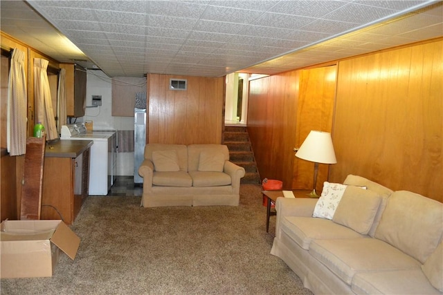 229 Everclay Dr, Greece, NY 14616 - carpeted living area featuring washer / clothes dryer, wooden walls, and stairs