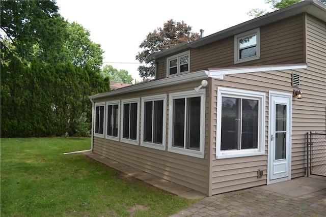 229 Everclay Dr, Greece, NY 14616 - view of side of home with a lawn and a patio