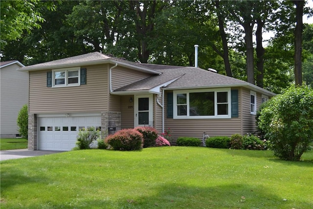 229 Everclay Dr, Greece, NY 14616 - tri-level home featuring a garage, a front yard, asphalt driveway, and roof with shingles