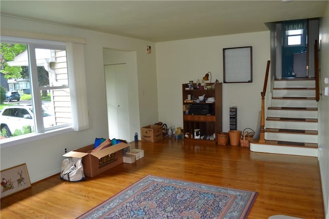 229 Everclay Dr, Greece, NY 14616 - living room with wood finished floors, plenty of natural light, and stairs
