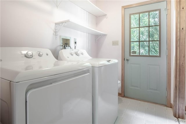 29591 Coon Bridge Rd, Theresa, NY 13691 - washroom with separate washer and dryer and light flooring