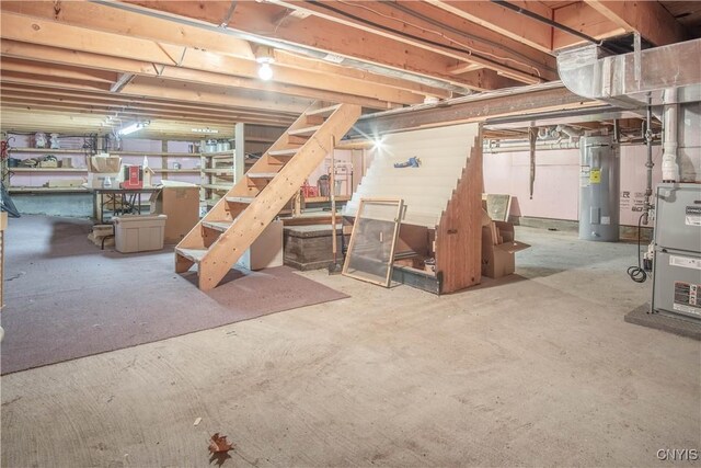 29591 Coon Bridge Rd, Theresa, NY 13691 - unfinished basement featuring water heater and stairs