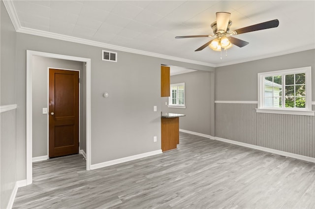 213 Auburn Ave, Gates, NY 14606 - empty room featuring wood finished floors, ceiling fan, and crown molding