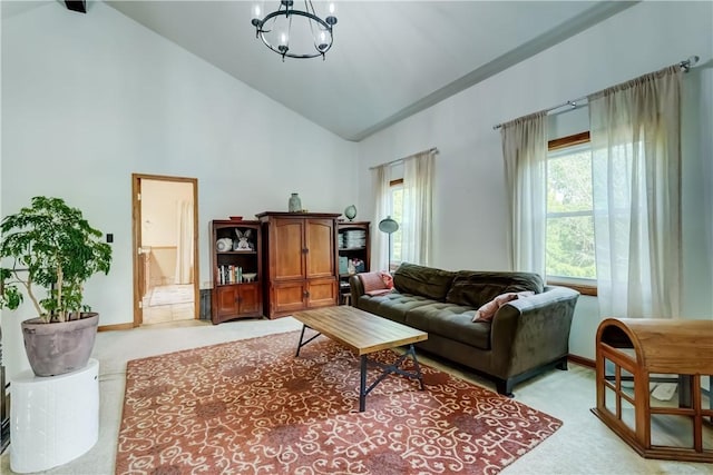 1544 Paddy Ln, Macedon, NY 14502 - living area with light colored carpet, a chandelier, and high vaulted ceiling