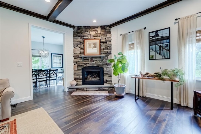 1544 Paddy Ln, Macedon, NY 14502 - living room with wood finished floors, plenty of natural light, ornamental molding, a chandelier, and beam ceiling