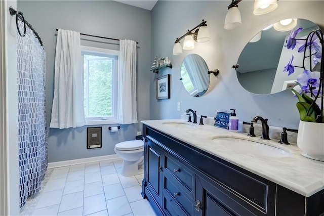1544 Paddy Ln, Macedon, NY 14502 - full bathroom with double vanity and toilet