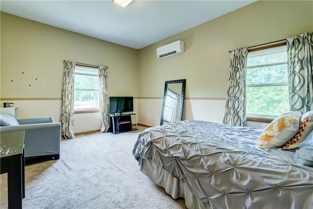1544 Paddy Ln, Macedon, NY 14502 - carpeted bedroom featuring a wall mounted air conditioner and baseboards
